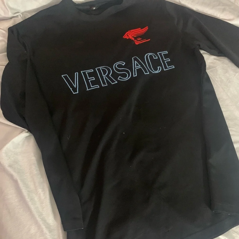 Versace - Picture 1 of 3